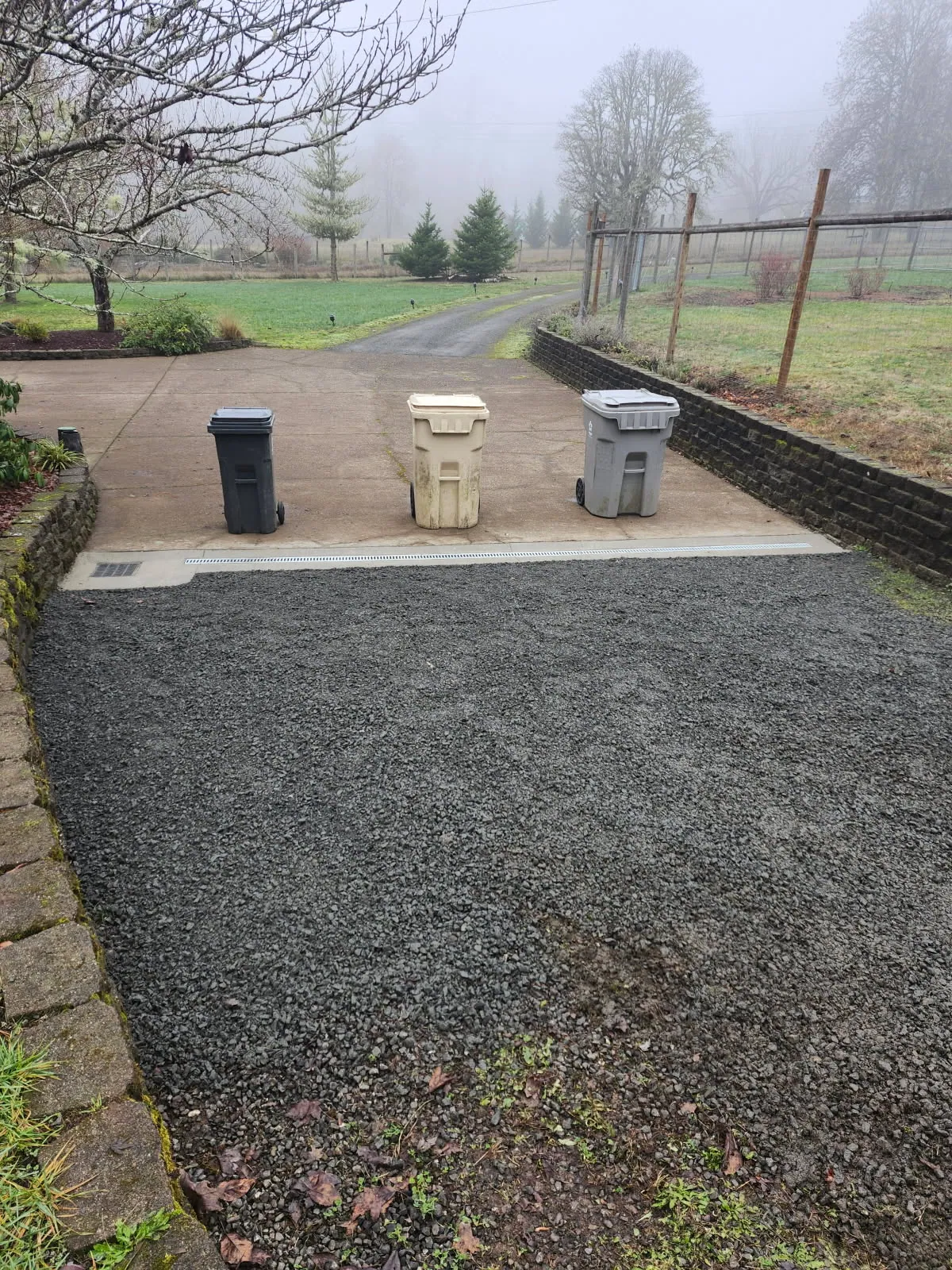 Finished gravel side yard with the bins back in place
